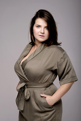 plus size model on gray background