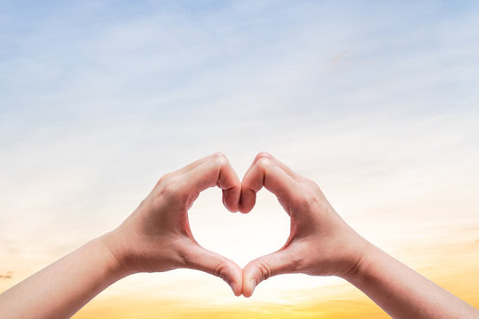 Woman Hold Hands Up To Sky In The Shape Of Love Heart On Nature Sun Light Flare And Cloud With Sky Background Valentine S Day Sign Of Love Hand Gesture Concept Copy Space Empty Blank Stock Photo Woman Hold Hands Up To Sky In The Shape Of Love Heart On Nature Sun Light Flare And Cloud With Sky Background Valentine S Day Sign Of Love Hand Gesture Concept Copy Space Empty Blank Stock Photo