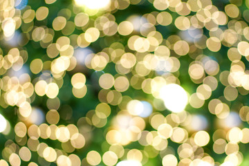 Abstract Circle Bokeh Blur yellow,orange and green Light Texture on bright Background.Beautiful Night light in the City on Chrismas.Natural,Abstract,Backdrop Concept.