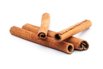 Top view cinnamon sticks isolated on white background.