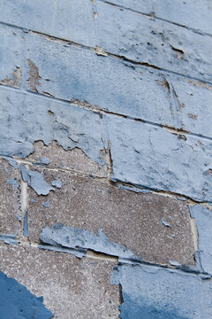 Blue wall with chipped paint texture. -Photo by Chris Korsak