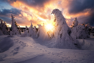 Dramatic sunrise in the Winter on the Brocken in the Harz mountains