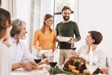 Happy big family celebrating Christmas together at home