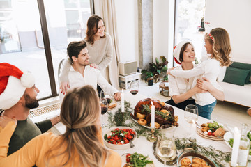 Happy big family celebrating Christmas together at home