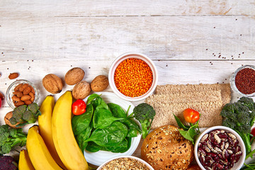 High Fiber Foods on white wooden background, Healthy balanced dieting concept. Top view, flat lay,...