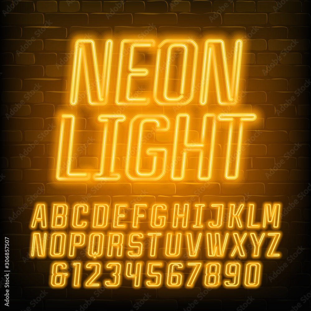 Fototapete neon alphabet font. yellow neon geometric letters and numbers. brick wall background. stock vector t