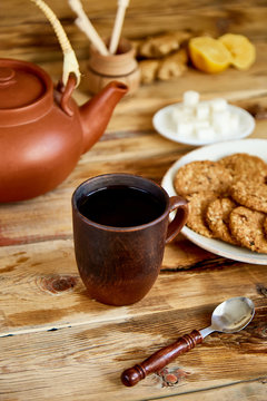 Afternoon tea, Tea Ceremony, Teapot Honey Cups of tea with cookies, biscuits on Old Rustic wooden Table Background.