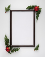 Christmas or New Year composition. Photo frame with copy space, Christmas tree branches and...