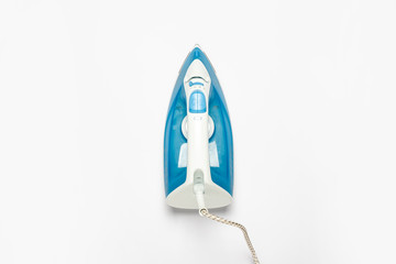 Iron for ironing things on a white isolated background. Laundry concept, tailoring studio,...