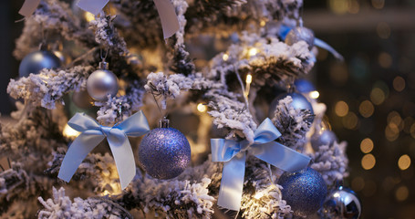 Christmas decoration ball in blue color at night