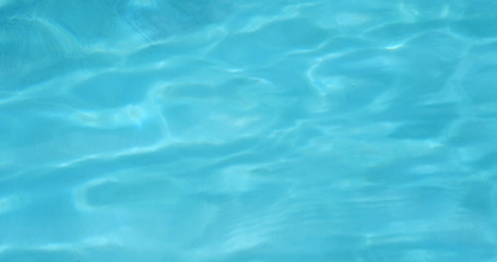 Blue water wave in swimming pool