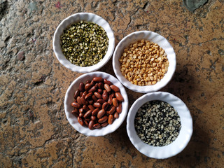 Prepared Pulses for cooking on the white bowl isolated on stone background