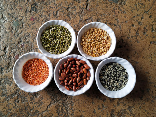 Prepared Pulses for cooking on the white bowl isolated on stone background