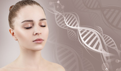 Naklejka premium Portrait of sensual woman among white DNA chains.
