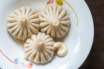hot delicious khinkali on a beautiful plate