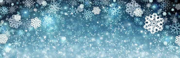 Blue christmas background with snowflakes. Winter background.