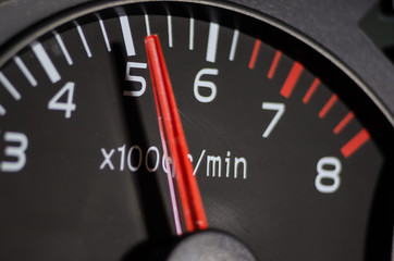 Close-up shot of the tachometer in the car. Car dashboard.