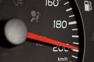 Close-up of the car speed meter. Car speedometer close up, speed 200