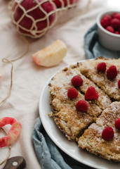 Apple pie with raspberries. Rustic style and zero waste concept.