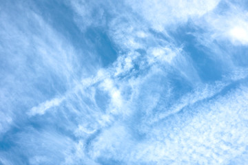 Beautiful clouds in a blue sky. Evening cloudscape.