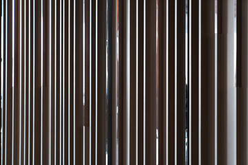 Detail of Random wooden strip wall in vertical direction