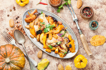 Baked chicken with pumpkin.