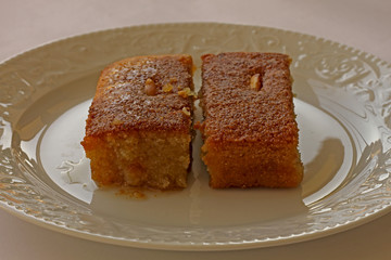 Shambali dessert made with semolina in a white plate.