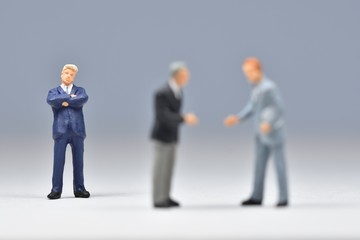 mini business men standing