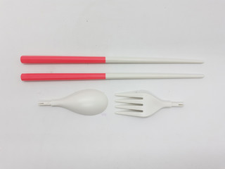 Beautiful Cute Luxury Modern Plastic Ceramics Folded Compact Detachable Eating Cutlery Spoon Fork Packaging for Dining Kitchen Appliances in White isolated Background