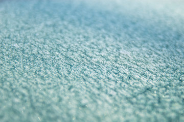 Winter drawing. Christmas background. Ice crystals on a glass.