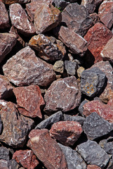  A bunch of multicolored stones.  Interesting rock texture.