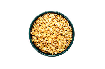 Rolled oats or old-fashioned oats in blue ceramic bowl on white background. Balanced diet and healthy eating concept. Close-up. Top view