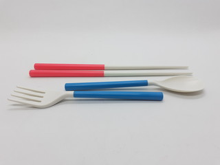 Beautiful Cute Luxury Modern Plastic Ceramics Folded Compact Detachable Eating Cutlery Spoon Fork Packaging for Dining Kitchen Appliances in White isolated Background