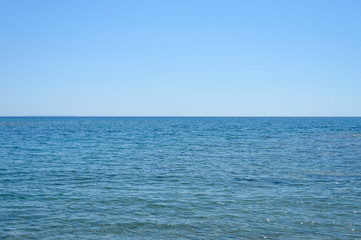 Fototapeta na wymiar Seascape. Beautiful landscape horizon with sea and clear sky. Outdoor activity in the nature