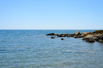 Seascape. Beautiful landscape with rocks, sea and clear sky. Outdoor activity in the nature