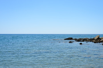 Seascape. Beautiful landscape with rocks, sea and clear sky. Outdoor activity in the nature