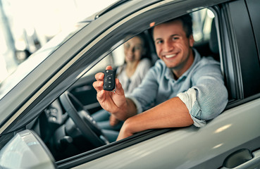 Obraz premium At a car dealership, buying a car