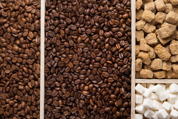 coffee beans with cup at wooden table background