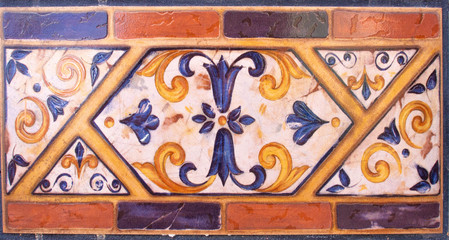 Detail of the traditional tiles from facade of old house. Decorative tiles.