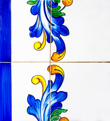 Detail of the traditional tiles from facade of old house. Decorative tiles.