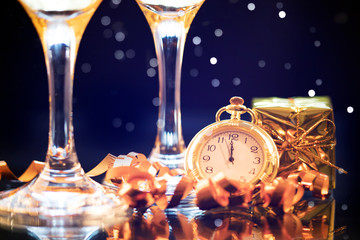 New Year's at midnight - Old clock with holiday lights