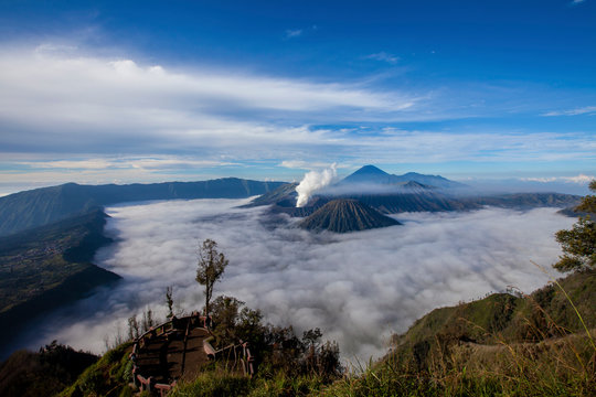 The beautiful mountaintop and crater of mount Bromo with sumeru in Indonesia that still active.