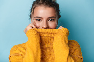 Portrait of beautiful happy woman looking at camera