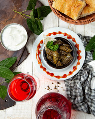 аzeri national dolma from grape leaves and katyk