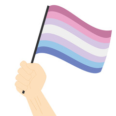 Hand holding and raising Bigender pride flag isolated on white background
