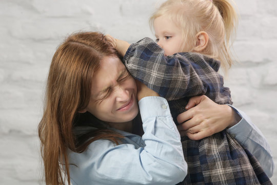 Little Toddler Girl Pulling Her Mother Hair