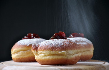 Hannukah celebration concept. Tasty donuts