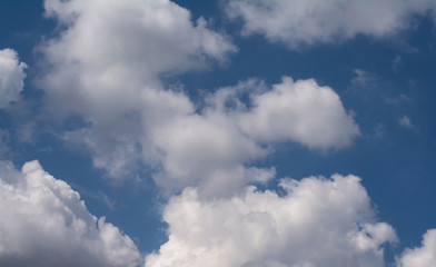 Clear blue sky and white clouds summer background