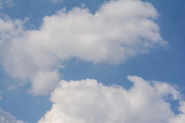 Clear blue sky and white clouds summer background