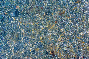 Pebbles in sea water